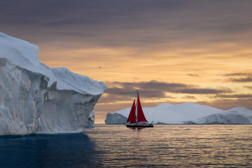 Sailing Between Giants